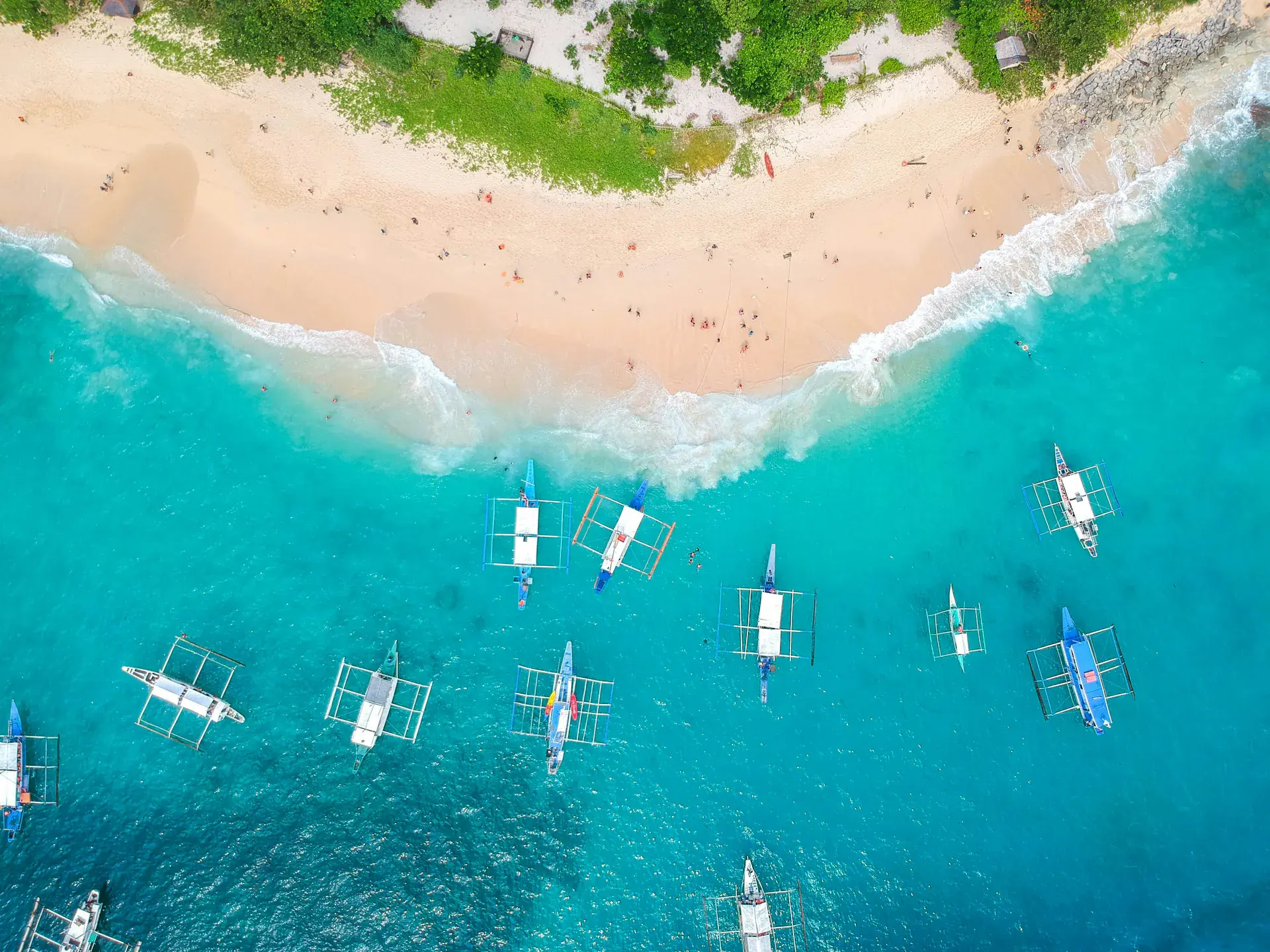 Helicopter Island and bright blue water on El Nido Tour C