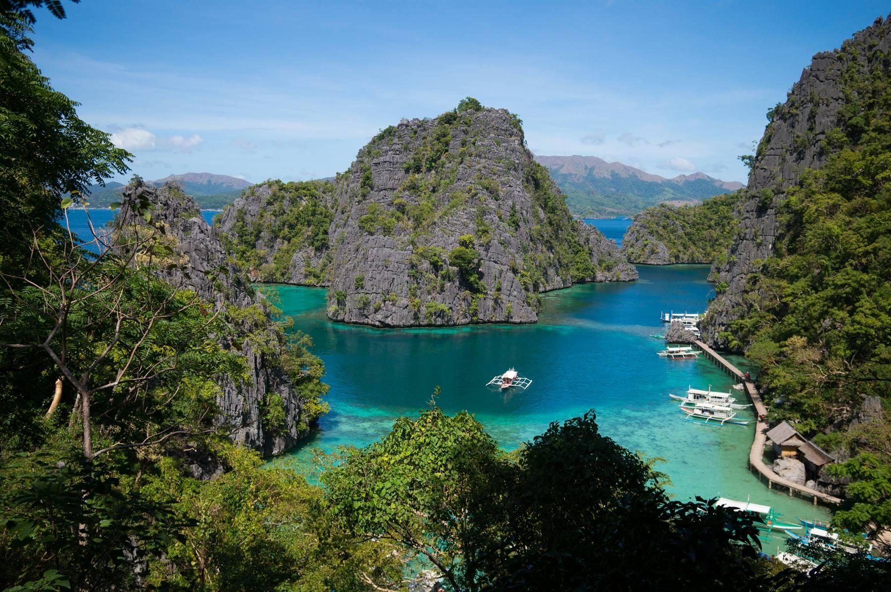 Coron's karst islands and turquoise bay seen from above