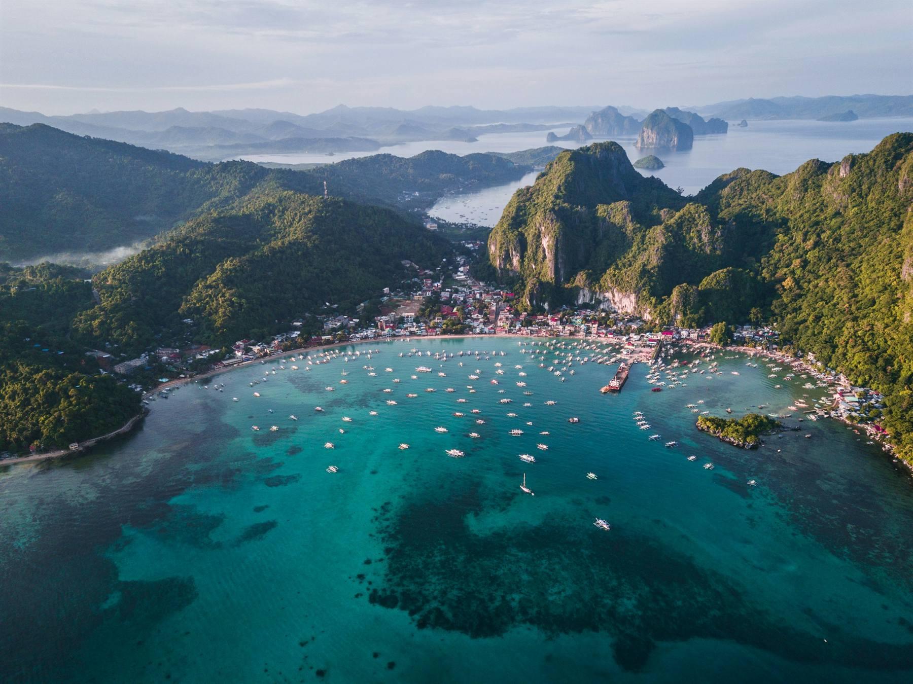 El Nido bay with limestone karst islands rising from turquoise water